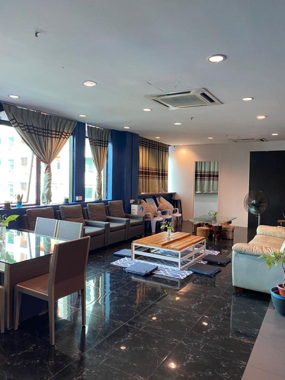Capsule Inn Kota Kinabalu Bagian luar foto